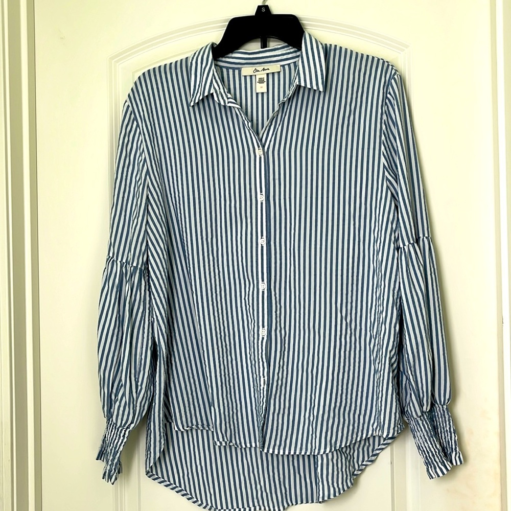 Medium chambray/white striped blouse with puffy smocked sleeves. Great condition